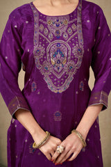 Wine Colored Viscose Jacquard Silk Straight Salwar Suit With Zari Weaving And Stone Work.