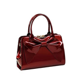 Women’s Glossy Bow Shell Handbag – PU Leather Tote with Double Handles & Adjustable Strap