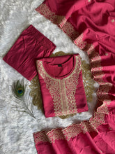 Graceful Peach Roman Silk Kurta Set with Detailed Embroidery