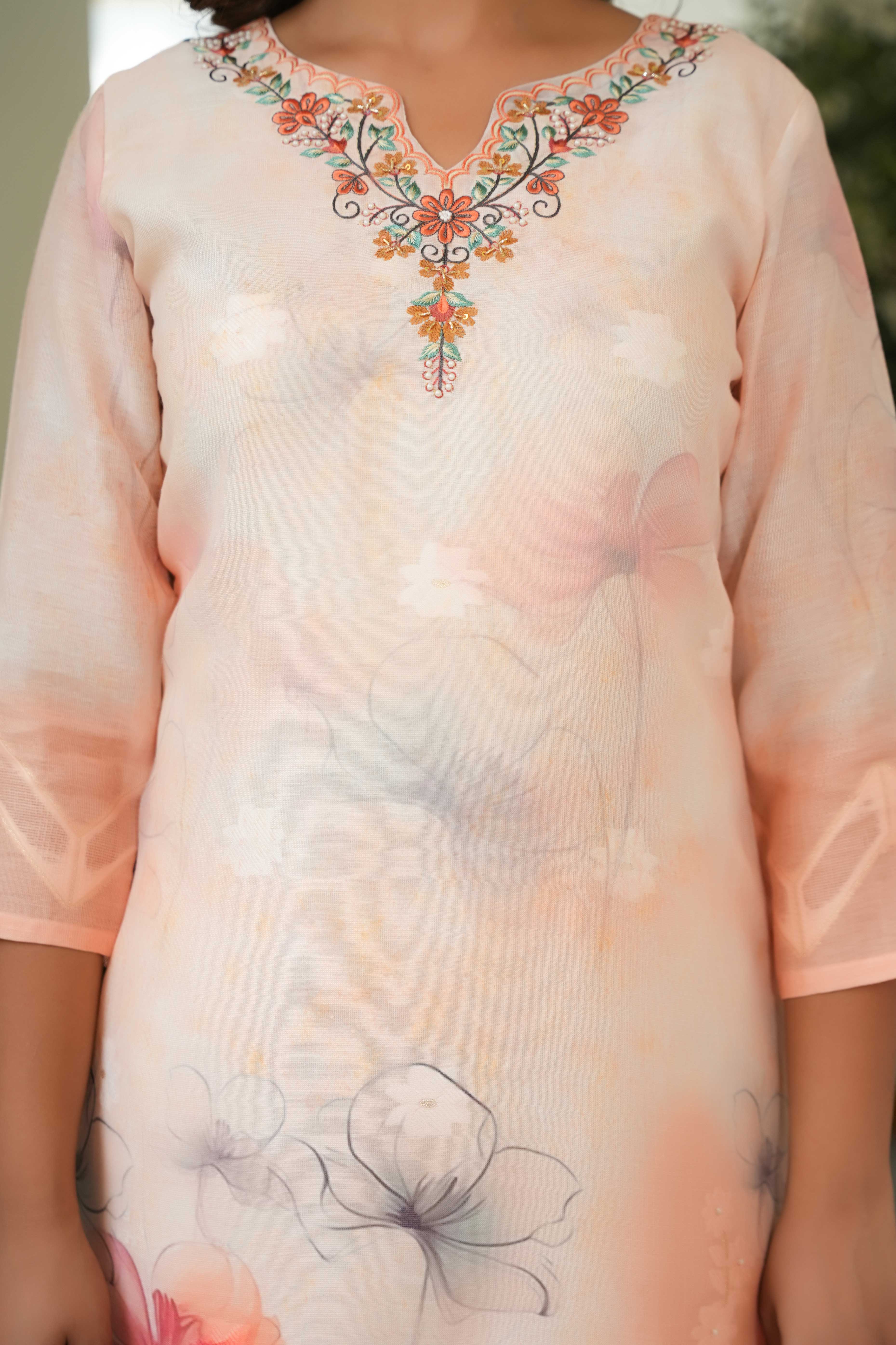 Graceful Light Orange Straight Salwar Suit with Floral Prints on Cotton Jacquard Fabric