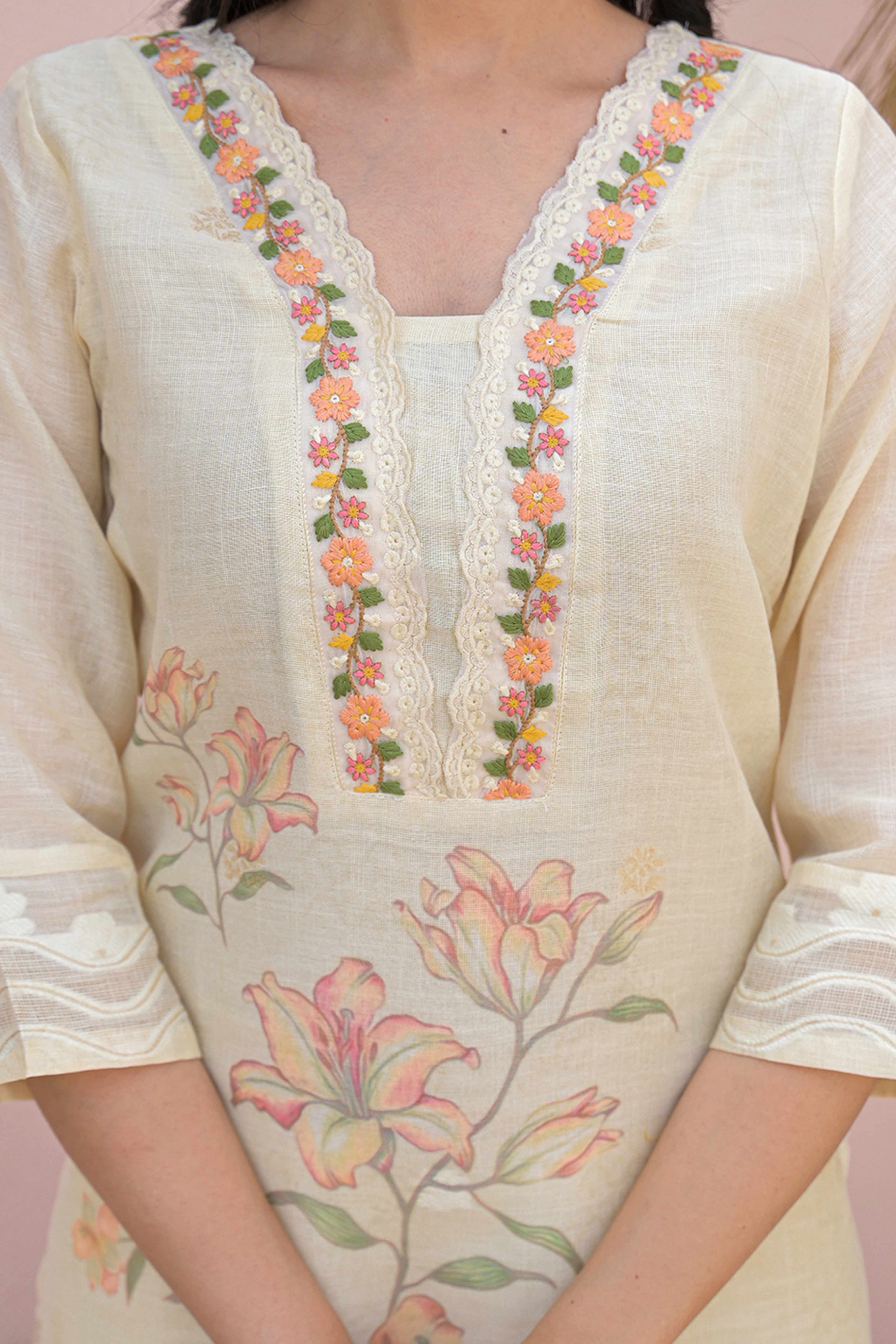 Powder Yellow Cotton Linen Salwar Suit with Printed Blooms and Delicate Embroidery Highlights