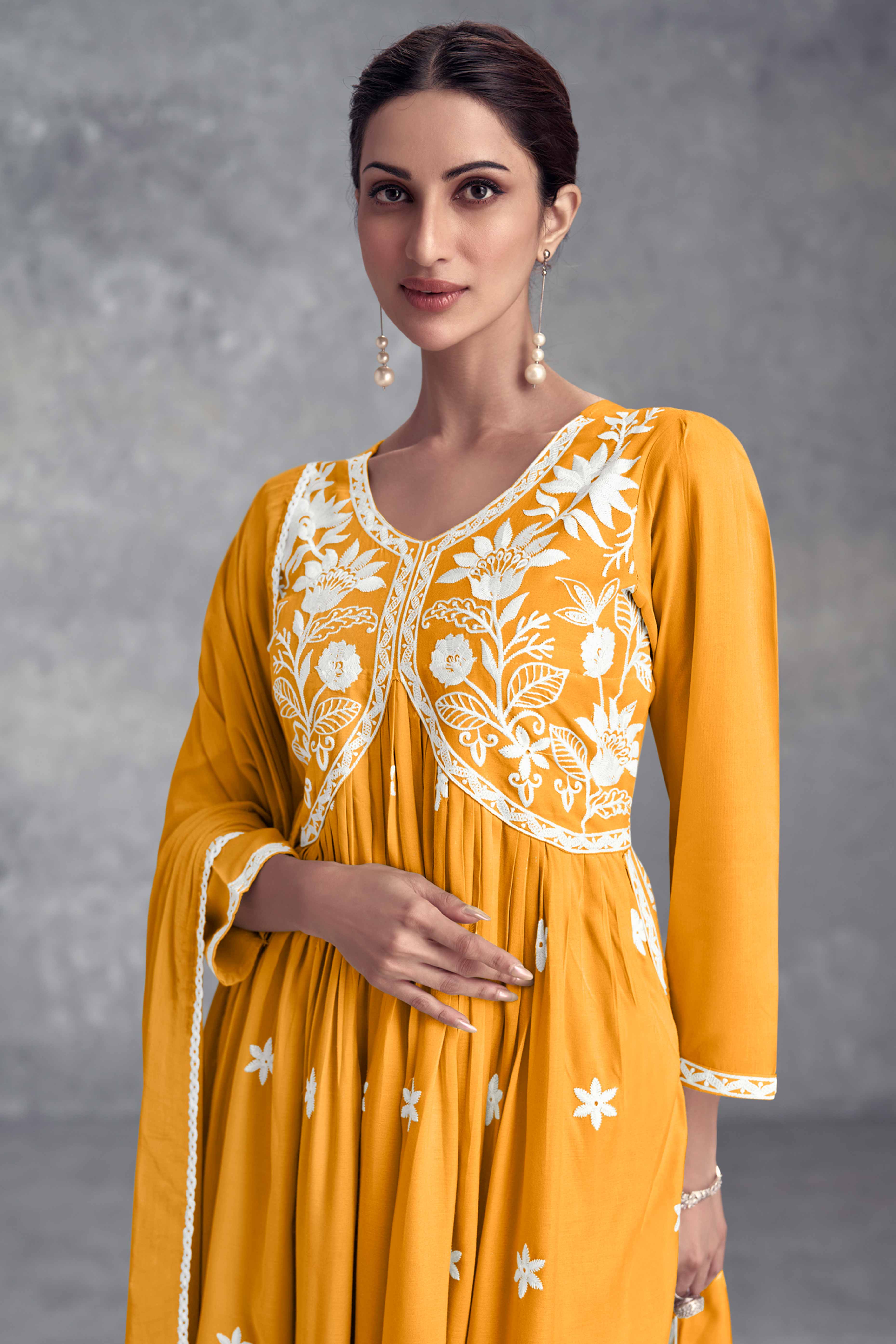 Mustard Rayon Salwar Suit Featuring Beautiful Floral Embroidery