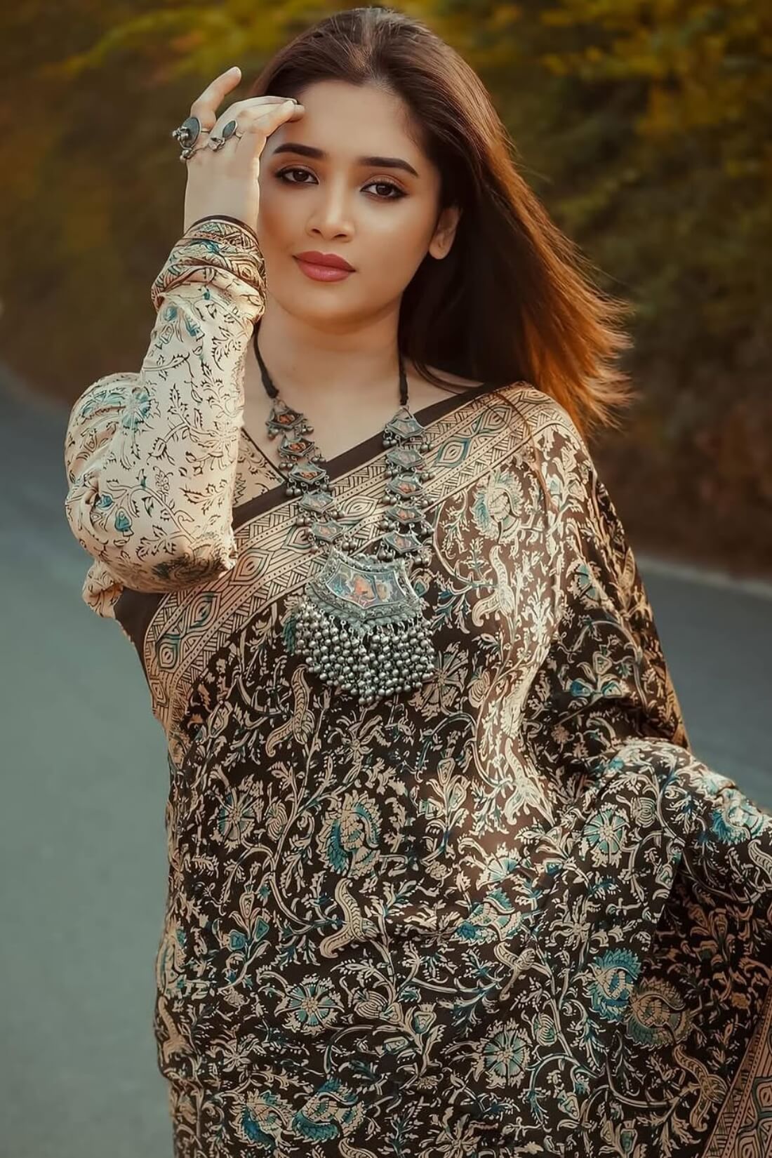 Gleaming Beige and Black  Digital Printed Crape Silk Saree