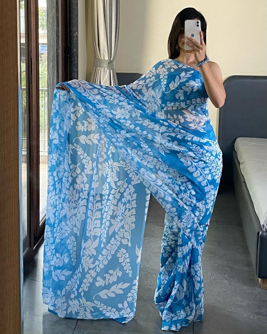 Elevate Your Wardrobe with This Stunning Firozi Georgette Saree