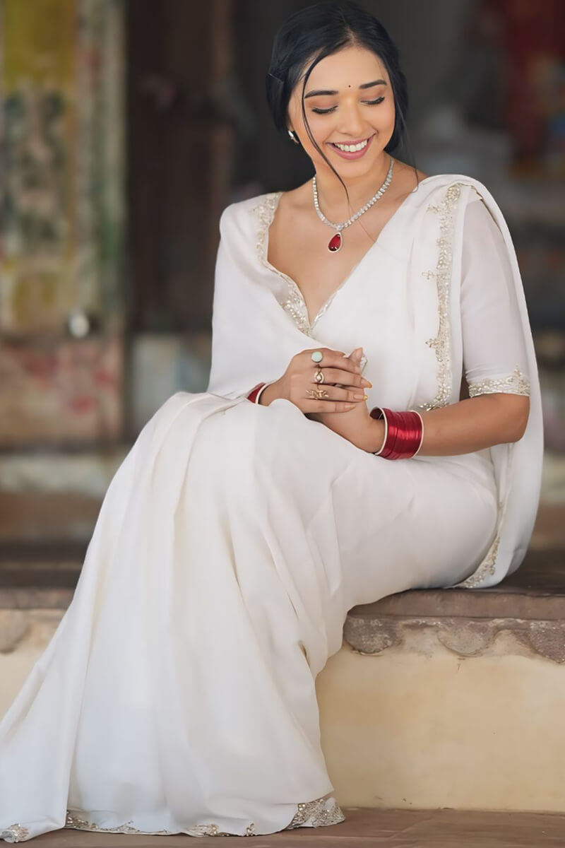 Elegant White Rangoli Silk Saree with Embroidered Border