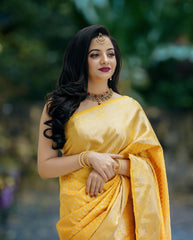 Yellow Banarasi Soft Silk Jacquard Saree with Beautiful Tassels