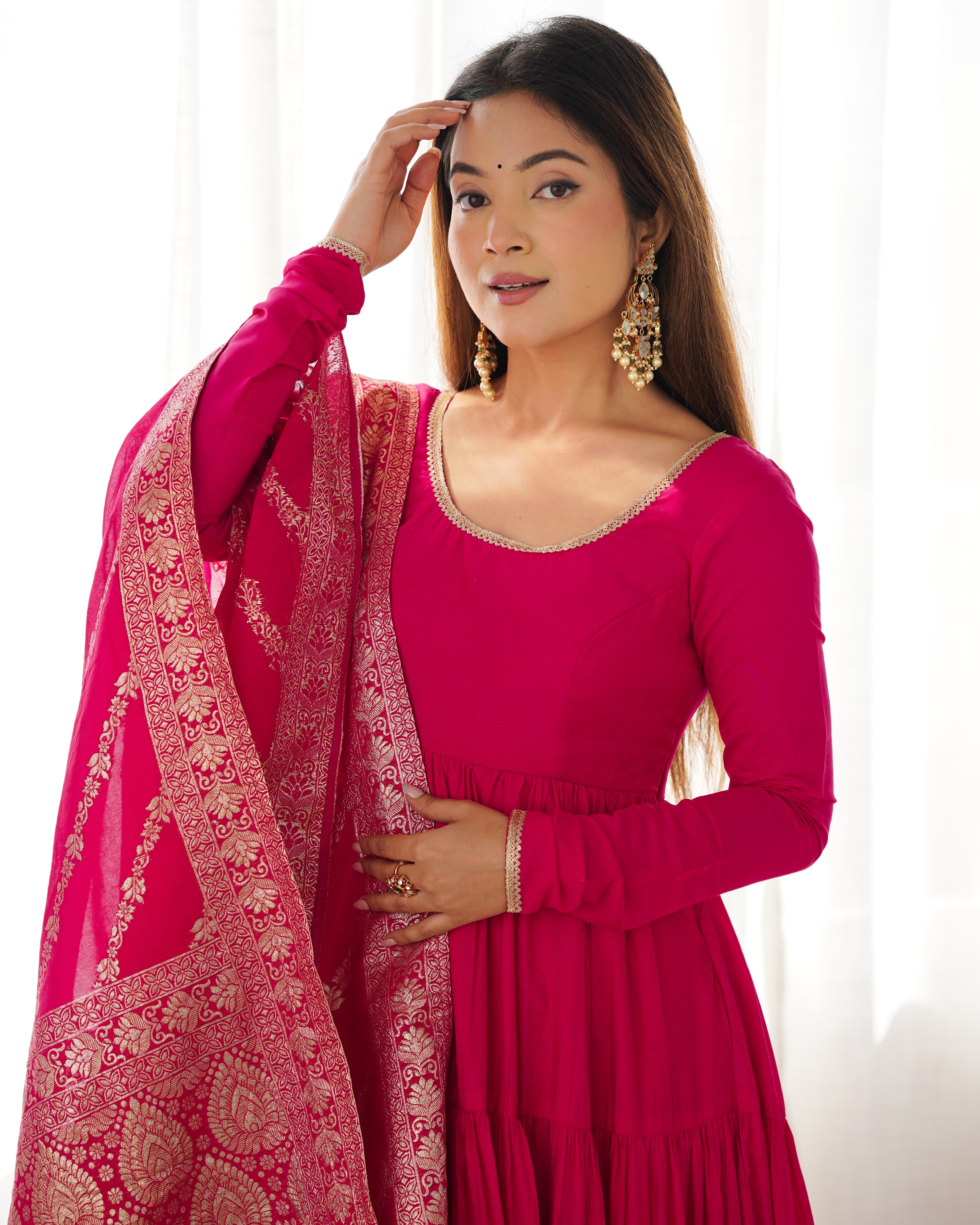 Rani Pink Pure Roman Silk Chanderi Anarkali Suit with Ruffle Flair & Banarasi Dupatta – Festive Wear